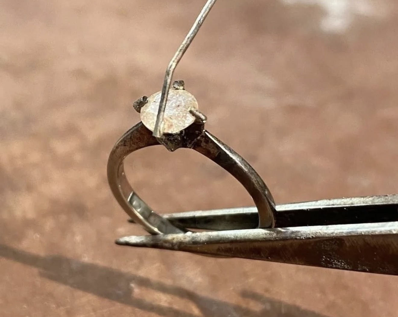 Stone loose and setting damaged